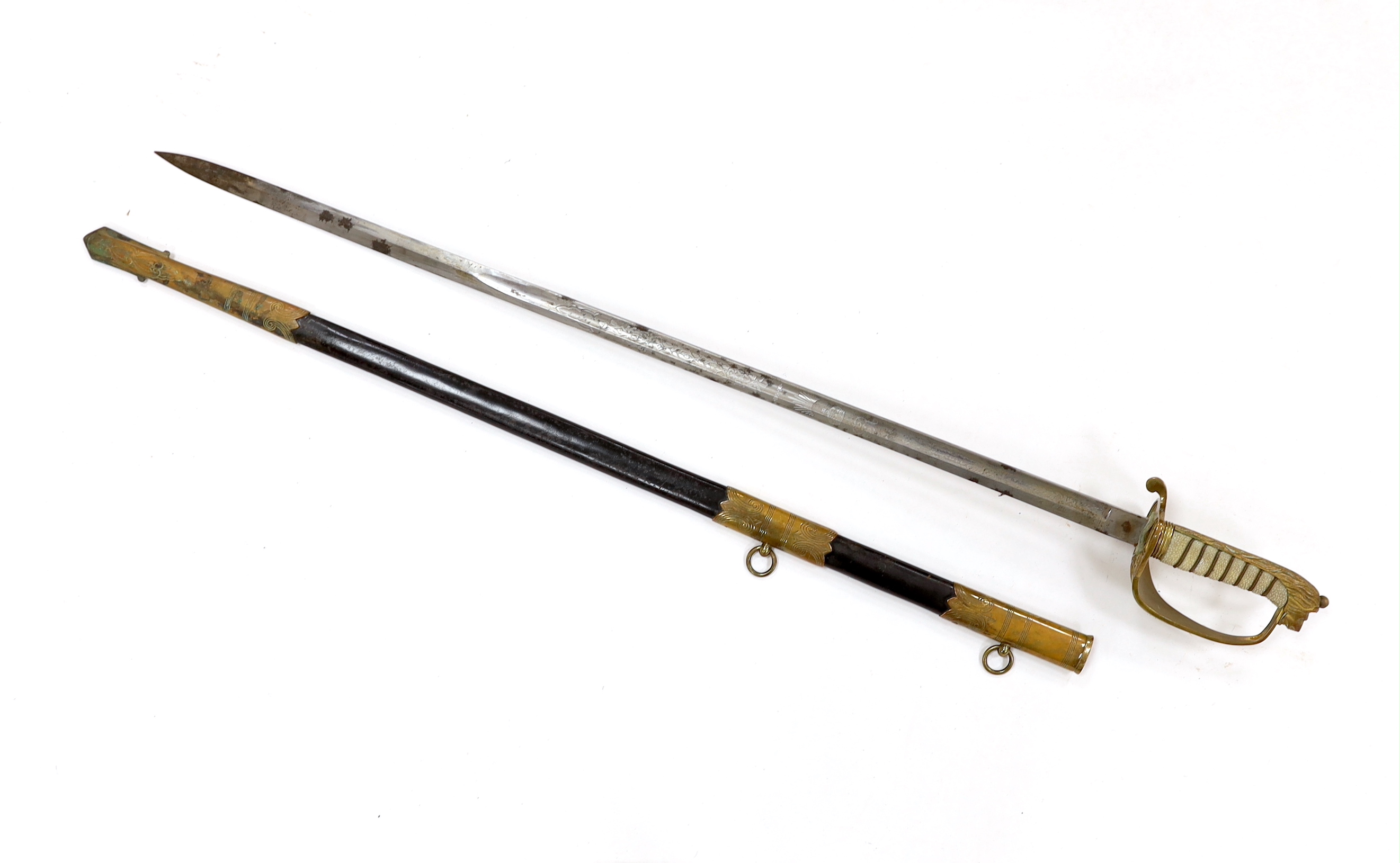 A George V naval officer’s sword, maker Grieves, in a leather scabbard, guard engraved G.P. Bewley, blade 79.5cm, together with outer leather cover
